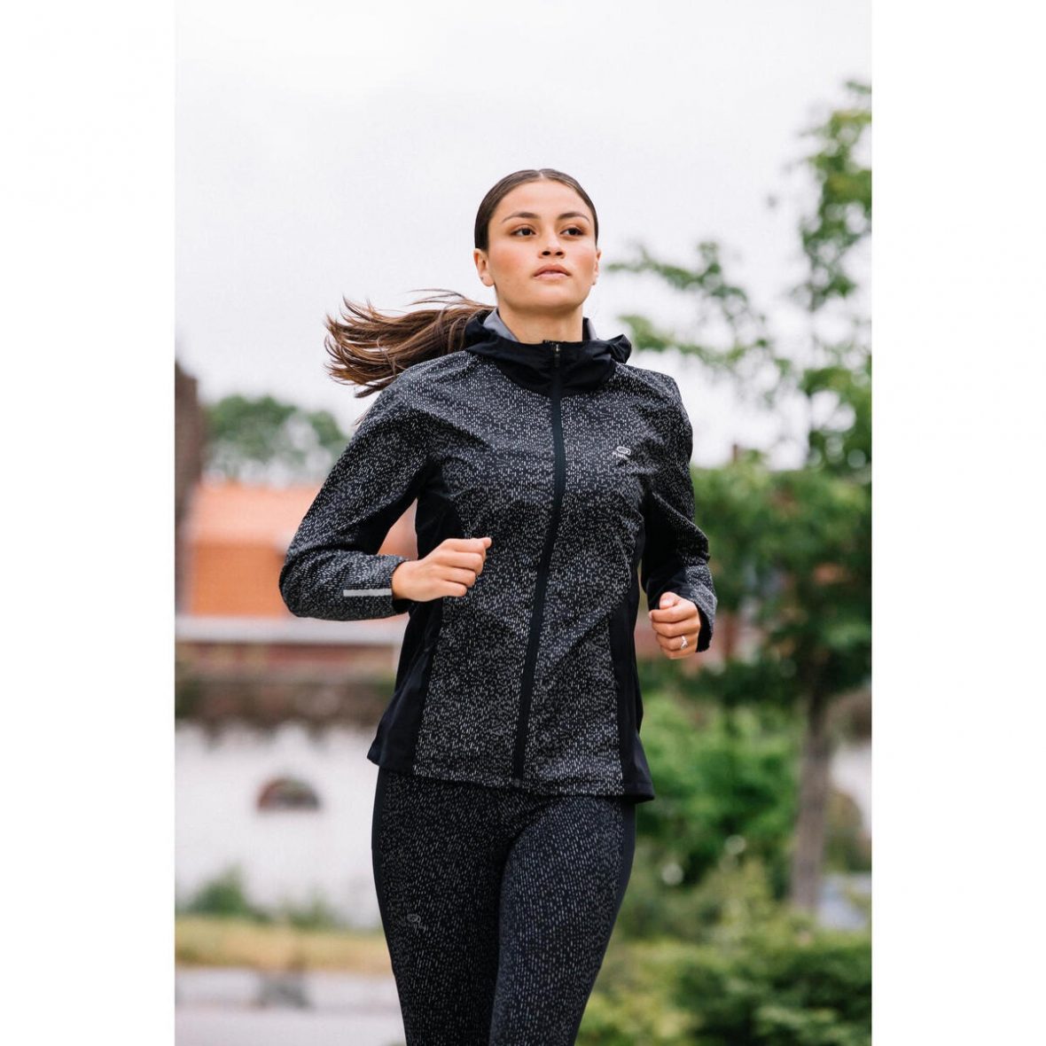 Kalenji Women’s Running Hooded Jacket with Reflective Patterns ktmart 1